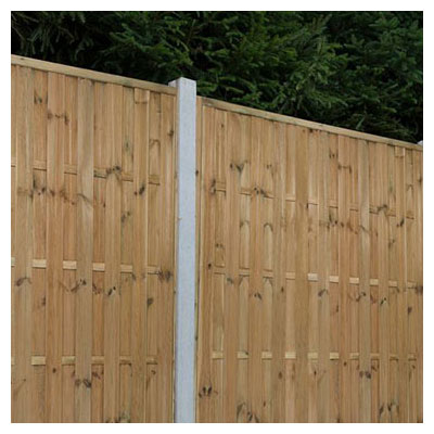 Forest 6x6 Vertical Hit and Miss Fence Panel - A close up of a vertical hit and miss fence panel between concrete posts