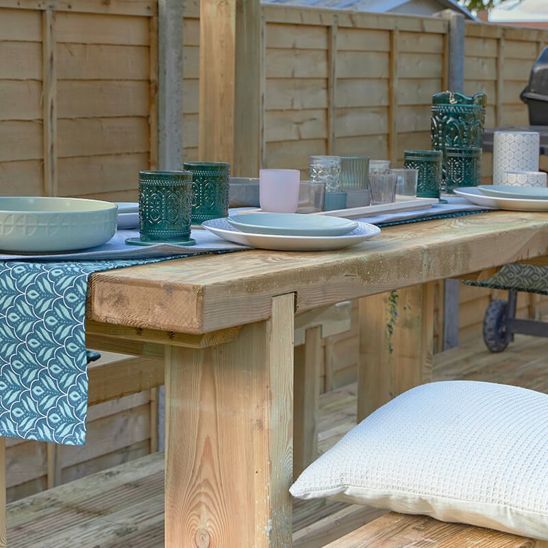 a garden table set - a place to sit and ponder your fence extension ideas