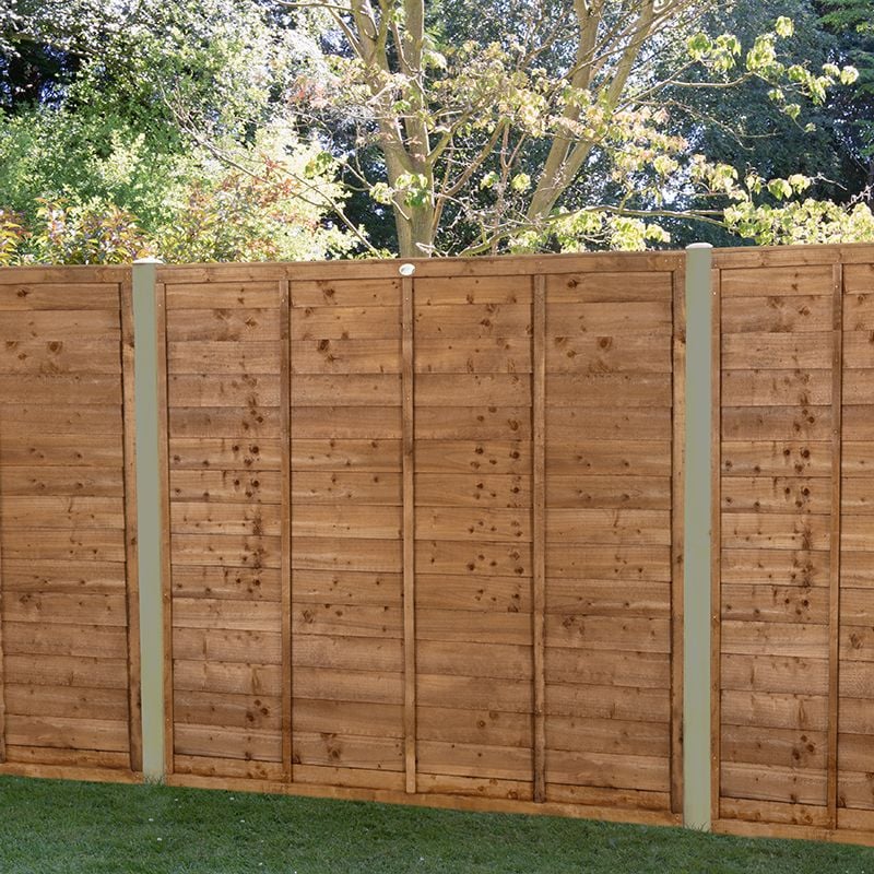 a sturdy brown pressure treated fence panel - ideal fencing for pets