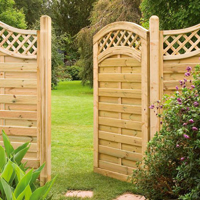 a decorative, wooden garden gate