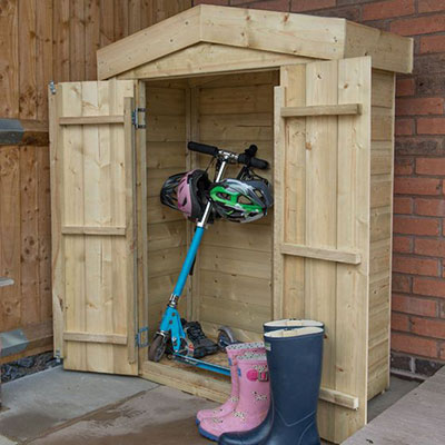 a high-quality wooden garden store containing a scooter