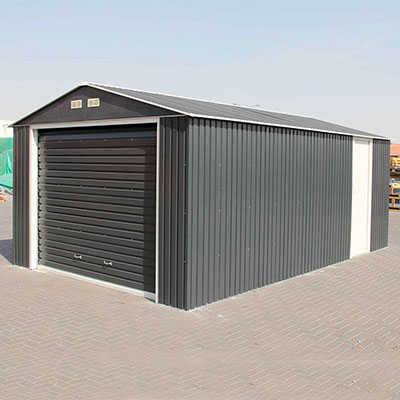 a 12x20 grey metal garage with a large up-and-over door