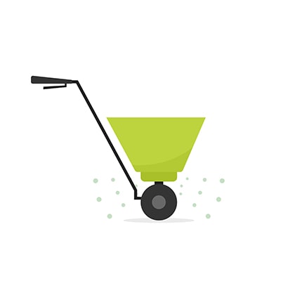 an icon showing fertiliser spreading on a lawn
