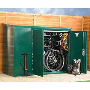The green 6x3 Asgard Premium Metal Bike Store, doors open, bikes and accessories inside.