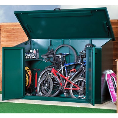 metal bike shed with bikes and helmets