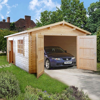 a large wooden garage, with open double doors revealing a car